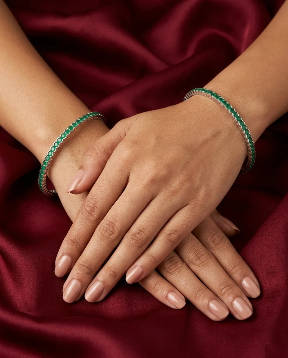 Emerald Eternity Bangle in rhodium polished 925 sterling silver, photo 1